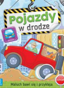 Maluch bawi się i przykleja. Pojazdy w drodze