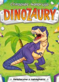 Chłopiec koloruje. Dinozaury